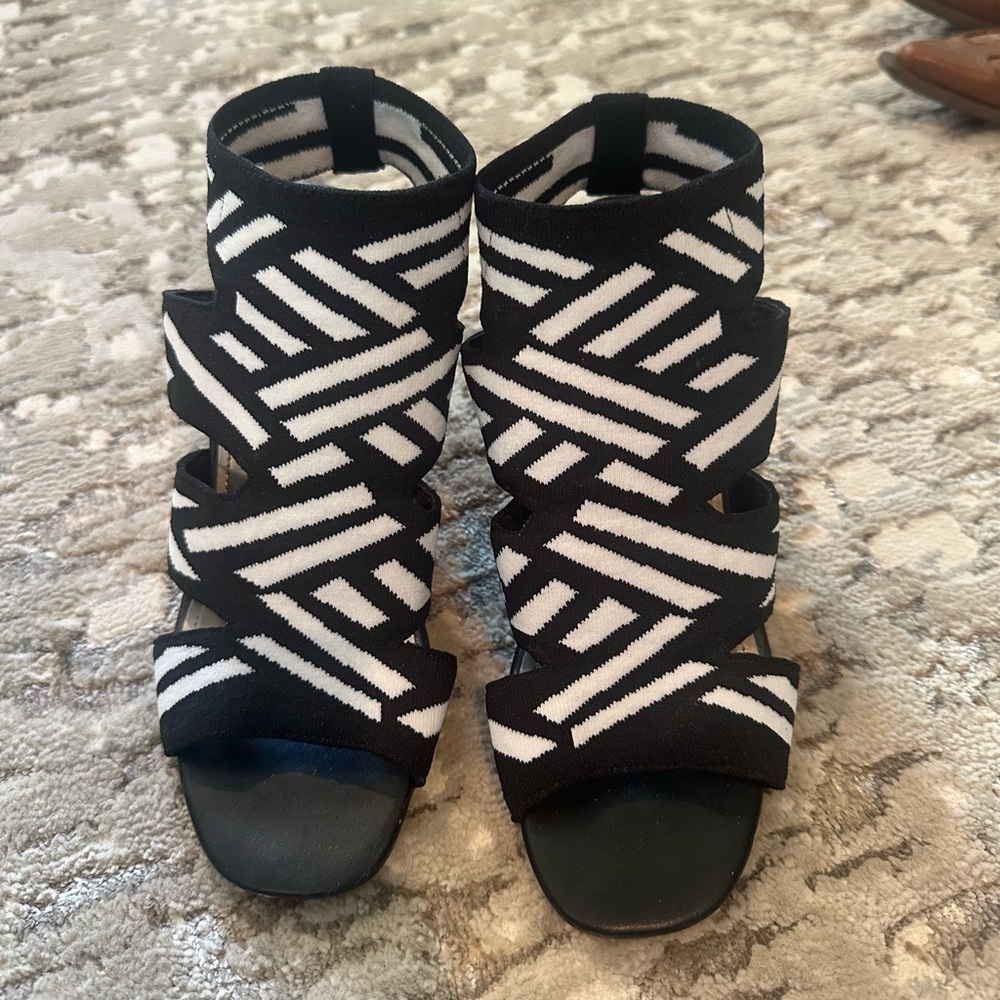 Strappy black and white heeled sandals